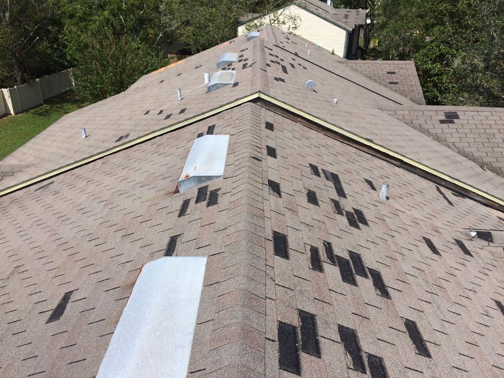 Hail storms can heavily damage roofs of buildings.